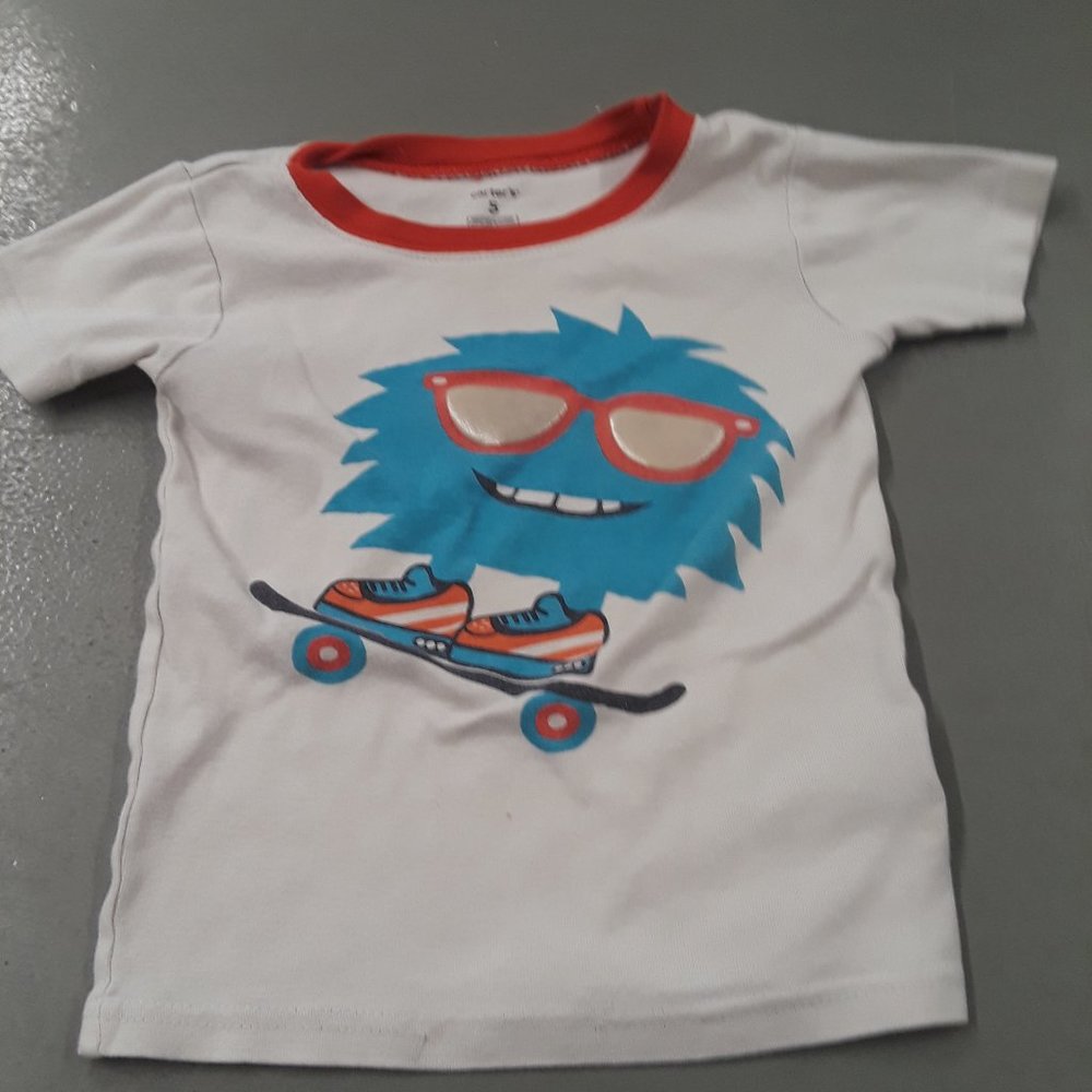 Carter's white T-shirt with skateboarding monster